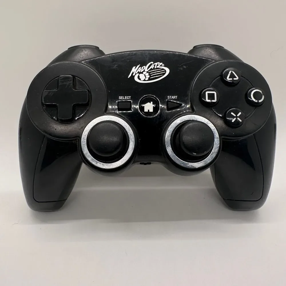 MadCatz Game Controller Wireless‎ Pad Battery PoweredBlack Dual Analog Sticks